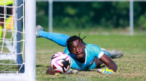 Sammy Harvey in action for his country